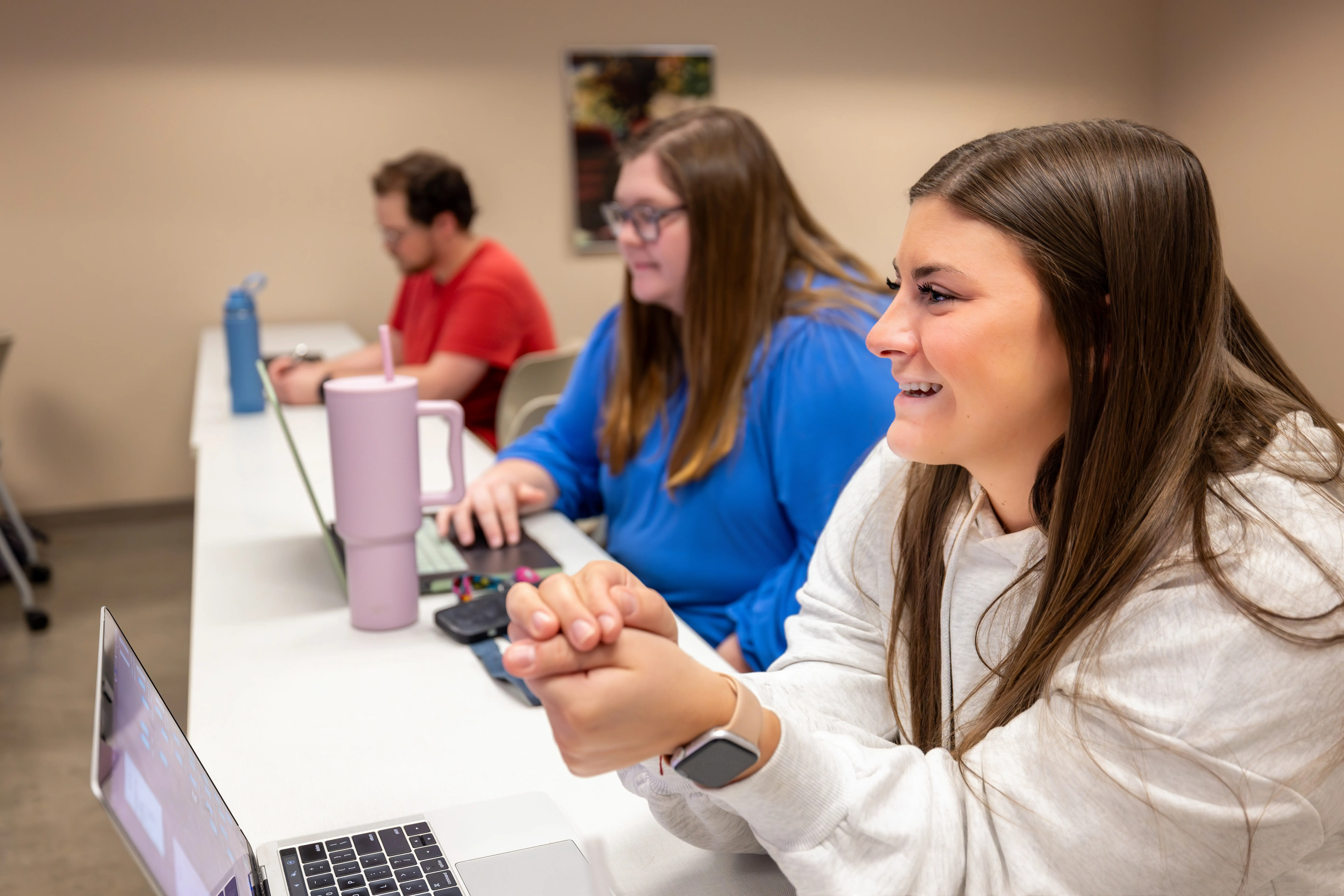 students working on laptops